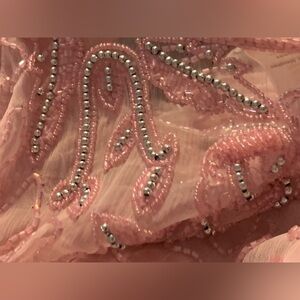 Hundred percent silk hundred percent polyester, lighting sequence blouse